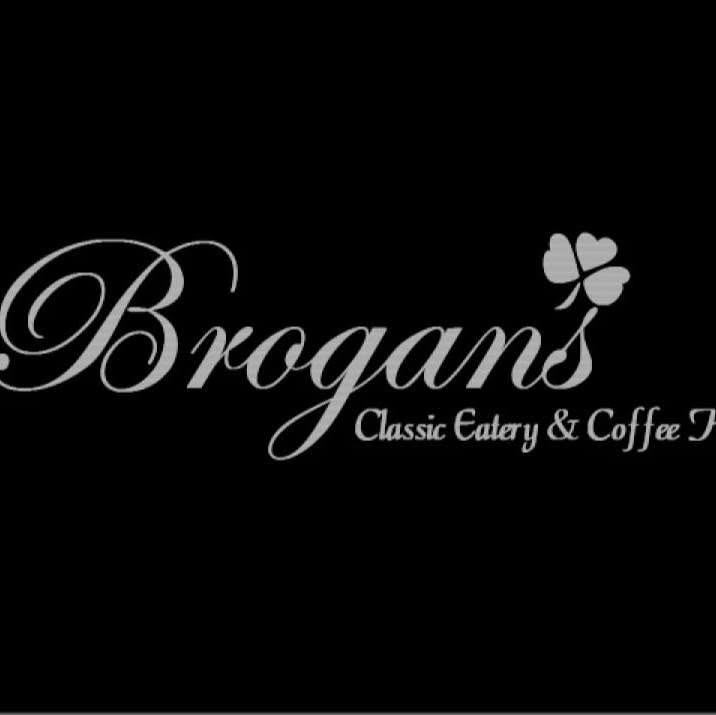 The Brogans sign: the name in silver script with a shamrock and the words Classic Eatery & Coffee House, on black